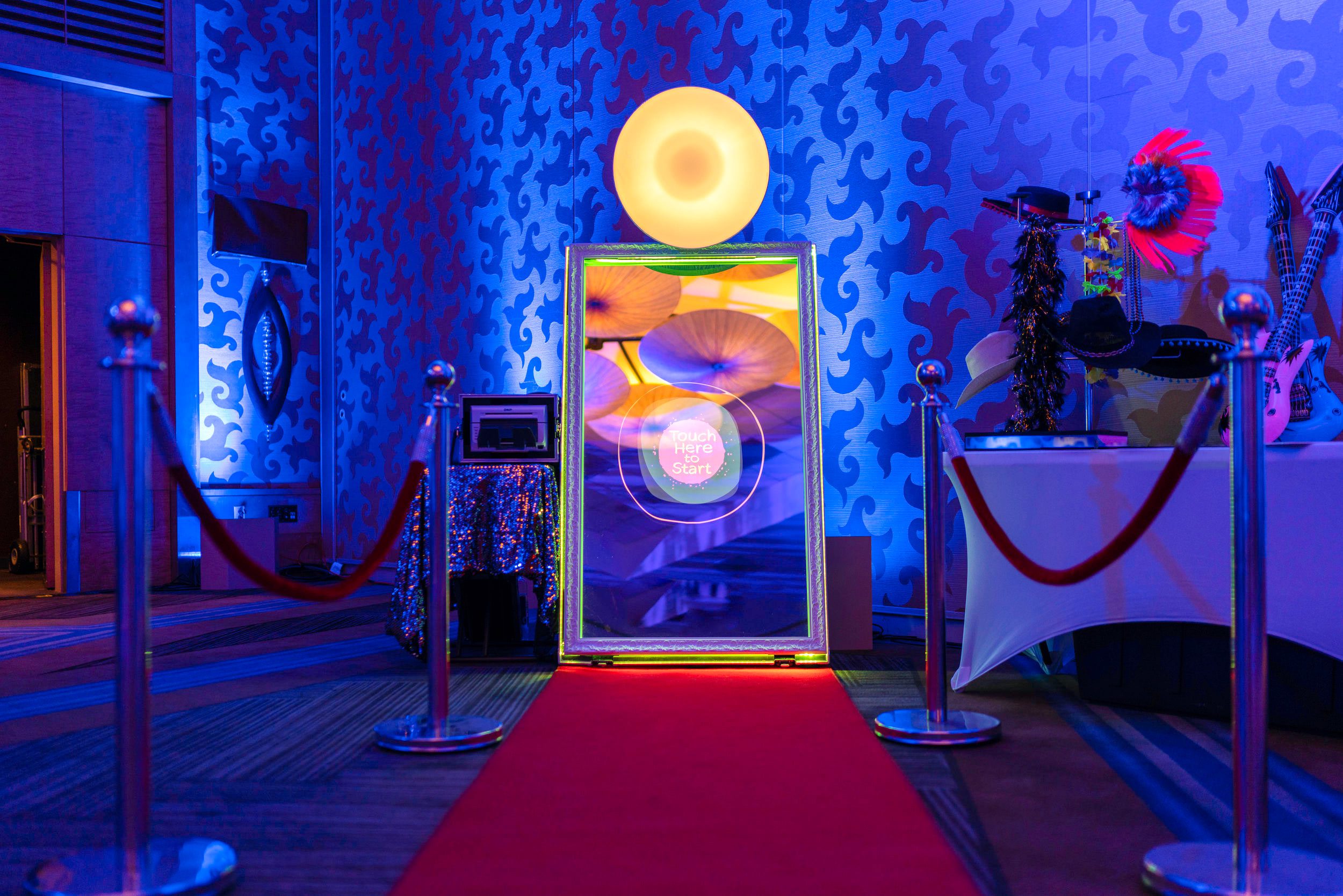 VIP Experience: Magic Mirror Photo Booth with Gold Stanchions and Red Velvet Ropes Capture the Magic with our VIP Gold Stanchions and Red Velvet Ropes Magic Mirror Photo Booth